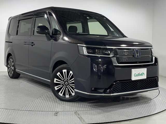 ホンダ ステップワゴン スパーダ eHEV プレミアムライン 広島県 2022(令4)年 2.8万km トワイライトミストブラックパール 純正9型ナビ/マルチビューカメラ/両側パワースライドドア/パワーテールゲート/ハーフレザーシート/前席/2列目シートヒーター/オットマン/ホンダセンシング/・衝突軽減ブレーキ/・レーンキープアシスト/・誤発進抑制機能/・パーキングセンサー/・ブラインドスポットインフォメーション/・アダプティブドライビングビーム/LEDヘッドランプ/純正17インチAW/ETC/ドライブレコーダー/USB入力端子