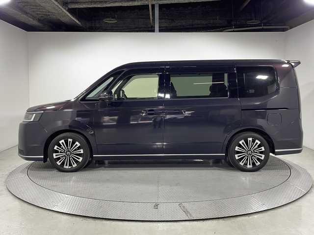 ホンダ ステップワゴン スパーダ eHEV プレミアムライン 広島県 2022(令4)年 2.8万km トワイライトミストブラックパール 純正9型ナビ/マルチビューカメラ/両側パワースライドドア/パワーテールゲート/ハーフレザーシート/前席/2列目シートヒーター/オットマン/ホンダセンシング/・衝突軽減ブレーキ/・レーンキープアシスト/・誤発進抑制機能/・パーキングセンサー/・ブラインドスポットインフォメーション/・アダプティブドライビングビーム/LEDヘッドランプ/純正17インチAW/ETC/ドライブレコーダー/USB入力端子