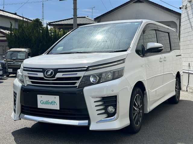 トヨタ ヴォクシー ZS 山形県 2014(平26)年 9.8万km ホワイトパールクリスタルシャイン 4WD/純正9インチナビ・フルセグTV/フリップダウンモニター/両側パワースライドドア/ビルトインET/横滑り防止機能/LEDヘッドライト/スマートキー2個/オートライト/フォグライト/純正16インチアルミホイール/スマートキー/プッシュスタート