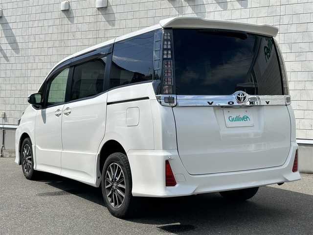 トヨタ ヴォクシー ZS 山形県 2014(平26)年 9.8万km ホワイトパールクリスタルシャイン 4WD/純正9インチナビ・フルセグTV/フリップダウンモニター/両側パワースライドドア/ビルトインET/横滑り防止機能/LEDヘッドライト/スマートキー2個/オートライト/フォグライト/純正16インチアルミホイール/スマートキー/プッシュスタート