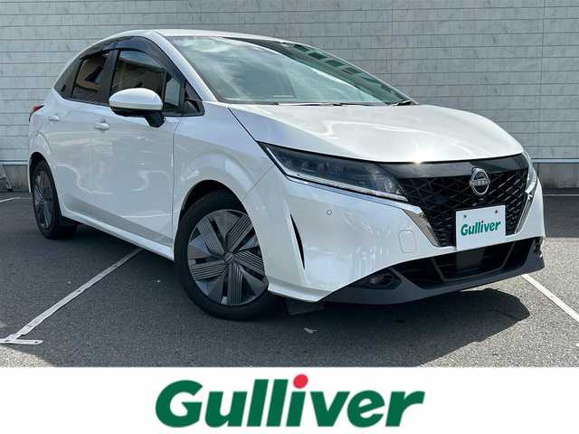 日産 ノート X 静岡県 2022(令4)年 2万km パール 9インチメーカーナビ/・フルセグTV/・Bluetooth接続/・USB入力端子/・AppleCarPlay/・AndroidAuto/プロパイロット/・先行車追従機能/・車線維持機能/・加減速制御/・ナビリンク機能/・標識検知機能/アラウンドビューモニター/BSM/追従クルコン/エマージェンシーブレーキ/スマートルームミラー/電動パーキングブレーキ/オートブレーキホールド/ワイヤレス充電/プッシュスタート/スマートキー/スペアキー/ETC2.0/ドラレコ/LEDオートライト・オートハイビーム/保証書/取扱説明書