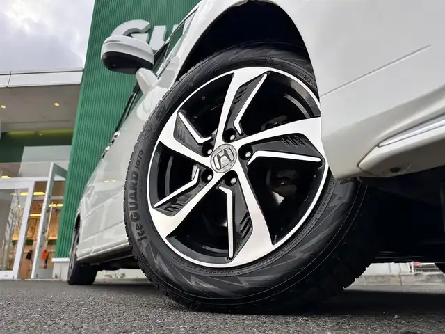 ホンダ オデッセイ ハイブリッド 宮城県 2017(平29)年 9.3万km ホワイトオーキッドパール ワンオーナー /純正ナビ /・フルセグTV/・Bluetooth/・CD/DVD/・HDMI/純正フリップダウンモニター　/360度カメラ　/コンフォートビューパッケージ　/両側電動スライドドア　/パワーシート　/純正エンジンスターター　/ビルドインETC　/純正ドライブレコーダー/車内純正アルミホイールサマータイヤ付き