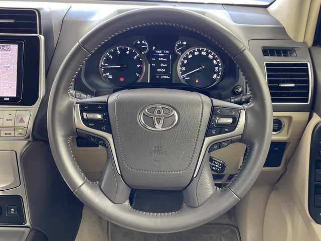 トヨタ ランドクルーザー プラド TX Lパッケージ マットブラED 岐阜県 2022(令4)年 3.8万km ホワイトパールクリスタルシャイン サンルーフ/純正9インチSDナビ/・フルセグ/BT/CD/DVD/本革シート【ベージュ】/トヨタセーフティセンス/前席シートヒーター/エアシート/ルーフレール/防眩インナーミラー/前後ドライブレコーダー/ステアリングスイッチ/スマートキー/ビルトインETC/スマートキー/LEDヘッドライト/フォグランプ