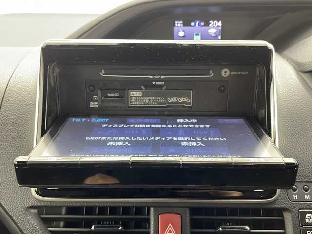 トヨタ エスクァイア ハイブリッド Gi プレミアムパッケージ ブラックテーラード 茨城県 2021(令3)年 4.2万km ブラック 純正ナビ/フルセグTV/バックカメラ/TRDエアロ/ドライブレコーダー/クルーズコントロール/フリップダウンモニター/両側パワースライドドア/ハーフレザーシート/純正15インチアルミホイール/コーナーセンサー/レーンアシスト/LEDヘッドライト