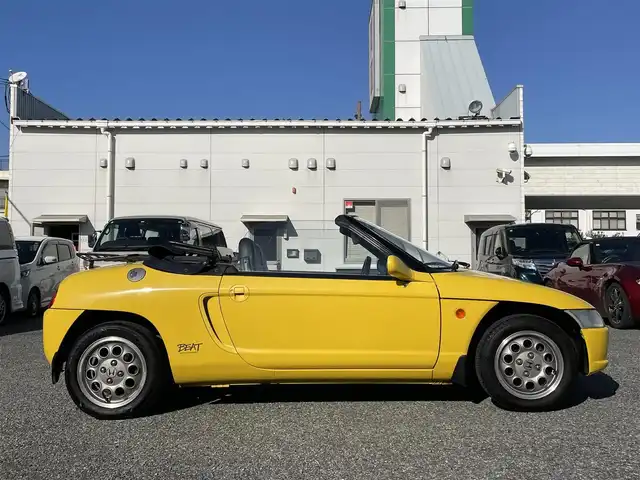 ホンダ ビート 兵庫県 1991(平3)年 6.6万km 黄 /MOMOステアリング//ETC//幌張替（ダークブルー）//パワーウィンドウ//シートカバー