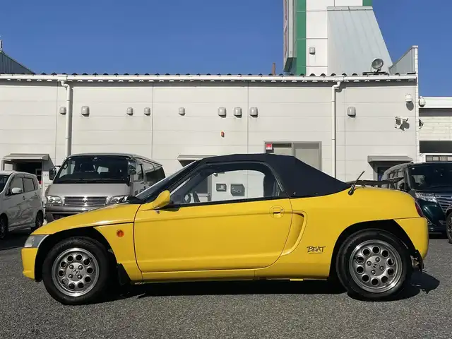 ホンダ ビート 兵庫県 1991(平3)年 6.6万km 黄 /MOMOステアリング//ETC//幌張替（ダークブルー）//パワーウィンドウ//シートカバー