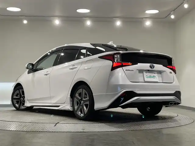 トヨタ プリウス A プレミアム　ツーリングセレ 愛知県 2021(令3)年 8.4万km プラチナホワイトパールマイカ 純正９インチナビ　/（AM/FM/DISC/フルセグTV/SD/Bluetooth)/モデリスタフルエアロ　/ワイヤレス充電　/トヨタセーフティセンス　/　　-衝突軽減ブレーキ/　　-レーンキープアシスト/　　-オートマチックハイビーム/　　-レーダークルーズコントロール/ＡＣ１００Ｖ　/インテリジェントパーキングアシスト/シートヒーター/エアシート　/ビルトインＥＴＣ　/バックカメラ/ブラインドスポットモニター　/デジタルインナーミラー　/ヘッドアップディスプレイ/クリアランスソナー/ＬＥＤヘッドライト/LEDフォグランプ/パワーシート/ドライブレコーダー/純正フロアマット/黒レザーシート