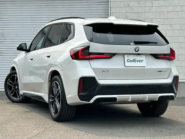 ＢＭＷ ＢＭＷ Ｘ１ xDrive 20i Mスポーツ 道東・釧路十勝 2023(令5)年 1.1万km ミネラルホワイト ４ＷＤ/ワンオーナー/純正ナビ/AppleCarPlay/全方位カメラ/アクティブクルーズコントロール/パドルシフト/パーキングアシスト/パワーバックドア/パワーシート/衝突軽減システム/ＡＷ付スタッドレス積込/純正フロアマット/プッシュスタート/スマートキー/オートライト/取扱説明書/保証書