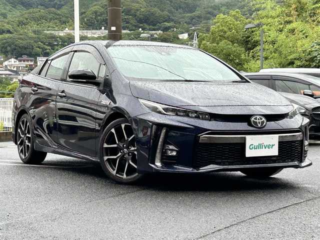 トヨタ プリウス ＰＨＶ S GRスポーツ 長崎県 2019(令1)年 9.8万km ダークブルーマイカ 純正SDナビ(FM/AM/BT/フルセグ/CD/DVD)/プッシュスタート/スマートキー/スペアキー1本/パワーウィンドウALL AUTO/EV/HVモード切替/ドライブモードセレクト/バックカメラ/前後ドラレコ/ビルトインETC/GRスポーツフロアマット/革巻きステアリング/ステアリングスイッチ/前席シートヒーター/純正18インチアルミホイール/ABS/レーンディパーチャーアラート/レーダークルーズコントロール/VSC/SRSダブル・サイドエアバッグ/SRSカーテンエアバッグ/取扱説明書/保証書/記録簿/ナビ取扱説明書