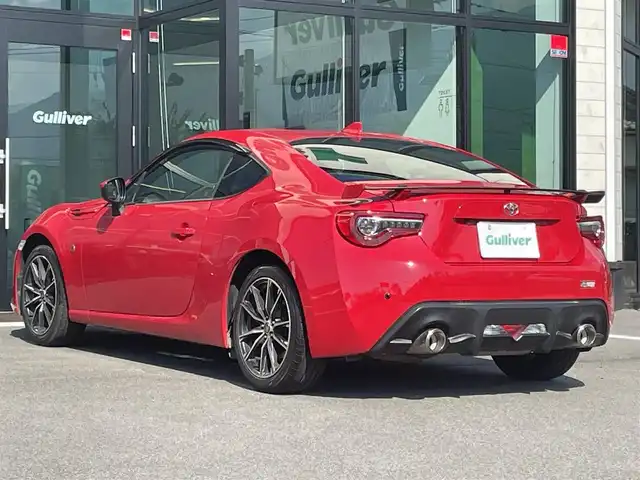 トヨタ ８６ GT リミテッド 愛媛県 2018(平30)年 2万km ピュアレッド 純正7型ナビ　/AM/FM/BT/フルセグTV/バックカメラ　/クルーズコントロール　/ドライブレコーダー　/D/N席シートヒーター　/ETC2.0　/前後コーナーセンサー　/シガーソケット/パドルシフト　/ステアリングリモコン　/電格ミラー　/ドアバイザー/リアスポイラー/現状サマー(純正AW)(215/45/R17)