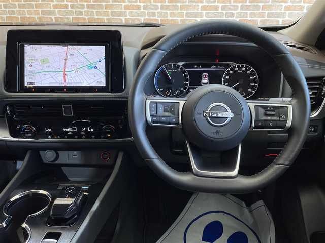 日産 エクストレイル S e－4ORCE 岐阜県 2023(令5)年 1.4万km ダイヤモンドブラック ４WD/e-4ORCE/エマージェンシーブレーキ/クルーズコントロール/車線逸脱警報/踏み間違い衝突防止支援/標識表示機能/オートブレーキホールド/前後ソナー/ハイビームアシスト/ヒルディセントコントロール/シートヒーター（１列目、２列目左右）/ステアリングヒーター/Pioneerナビ/バックカメラ/ETC/ドライブレコーダー/LEDヘッドライト/フォグランプ/純正18インチアルミホイール