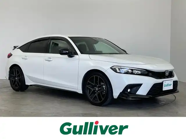 ホンダ シビック e:HEV 埼玉県 2022(令4)年 3.1万km プラチナホワイトパール 純正ディスプレイオーディオ　バックカメラ　ＢＳＭ　ビルトインＥＴＣ２．０　前後ドラレコ　ＢＯＳＥ　ホンダセンシング　アダクティブクルーズコントロール　シートヒーター　ワイヤレス充電　ＬＥＤライト　ＴＶ