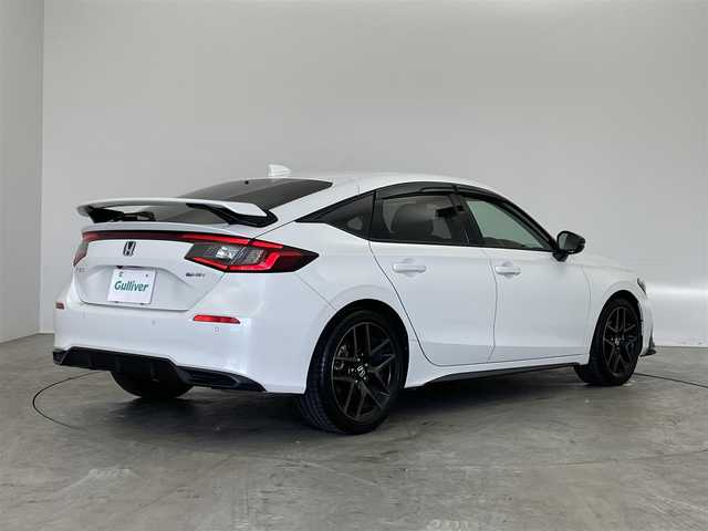 ホンダ シビック e:HEV 埼玉県 2022(令4)年 3.1万km プラチナホワイトパール 純正ディスプレイオーディオ　バックカメラ　ＢＳＭ　ビルトインＥＴＣ２．０　前後ドラレコ　ＢＯＳＥ　ホンダセンシング　アダクティブクルーズコントロール　シートヒーター　ワイヤレス充電　ＬＥＤライト　ＴＶ