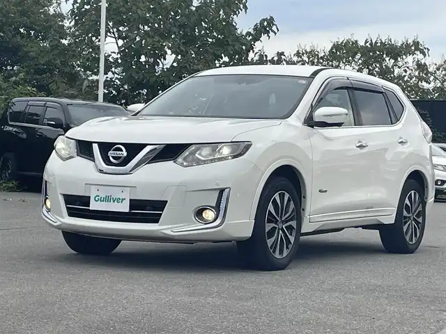 日産 エクストレイル ハイブリッド モード・プレミア 山形県 2016(平28)年 5.5万km ブリリアントホワイトパール ４WD/衝突軽減/純正SDナビ/　　【CD　BT　ワンセグ　USB　AUX】/アラウンドビューモニター/パワーバックドア/クルーズコントロール/LEDオートライト/レザーシート/シートヒーター/18インチアルミホイール/レーンキープアシスト/ダウンヒルアシストコントロール/純正フロアマット/コーナーセンサー/スマートキー/ETC