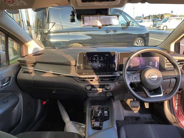 日産 ノート X 愛知県 2023(令5)年 0.9万km ピンク 純正9型ディスプレイオーディオナビ/全方位カメラ/コーナーセンサー/バックカメラ/コーナーセンサー/ETC2.0/LEDヘッドライト/インテリジェントミラー/オートマチックハイビーム/ドライブレコーダー/オートマチックハイビーム/衝突軽減システム/フルセグ/Bluetooth/ステアリングスイッチ/スマートキー/プッシュスタート