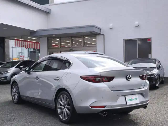 マツダ マツダ３セダン 20S プロアクティブ 熊本県 2021(令3)年 1.3万km ソニックシルバーM ワンオーナー/純正ナビ/【フルセグテレビ/Bluetooth/USB/HDMI/CD/DVD】/360°ビューモニター/クルーズコントロール/衝突被害軽減ブレーキ/レーンキープアシスト/ブラインドスポットモニター/ステアリングスイッチ/パーキングセンサー/電子パーキング/オートホールド/オートハイビーム/純正18インチアルミホイール/アイドリングストップ/横滑り防止/MTモード/パドルシフト/ウインカーミラー/取扱説明書