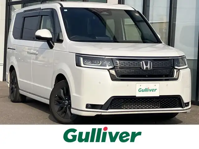 ホンダ ステップワゴン スパーダ 道南・函館 2024(令6)年 2.3万km プラチナホワイトパール /純正ナビ//フルセグTV//寒冷地仕様//全周囲カメラ//シートヒーター//パワーバックドア//オットマン//両側パワースライドドア//衝突被害軽減ブレーキ//レーダクルーズコントロール//レーンキープアシスト//ＥＴＣ