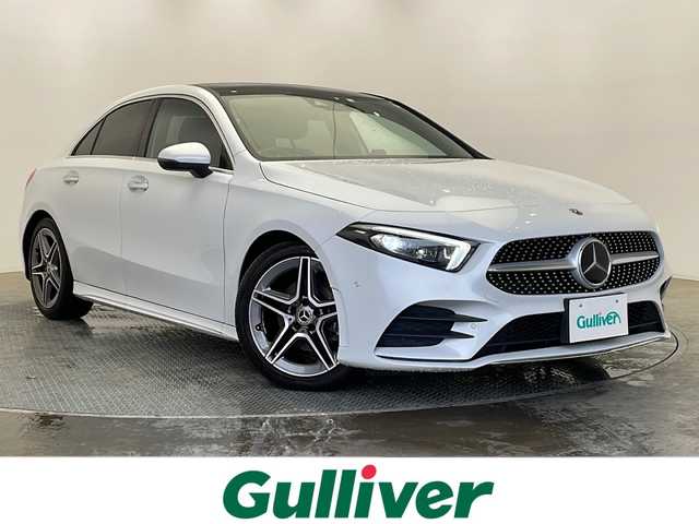 メルセデス・ベンツ Ａ１８０ セダン スタイル AMGライン 栃木県 2020(令2)年 2万km デジタルホワイト 純正メーカーOPナビ/（フルセグTV/BT）/バックカメラ/パノラミックスライディングルーフ/衝突軽減ブレーキ/BSM/コーナーセンサー/ETC/前方ドラレコ/パワーバックドア/ハーフレザーシート/パワーシート/シートヒーター/メモリーシート/LEDヘッドライト/パドルシフト/横滑り防止装置/スマートキー/アイドリングストップ/純正アルミホイール/純正フロアマット