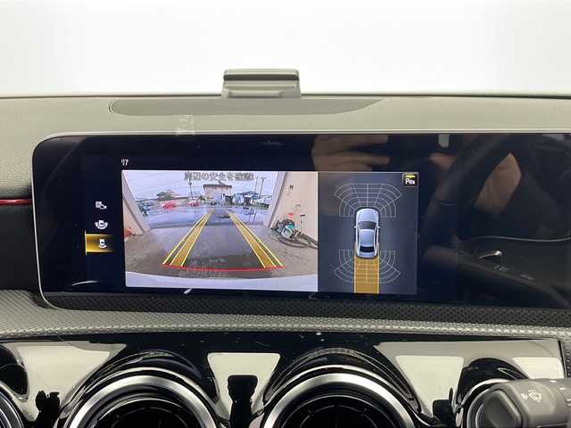 メルセデス・ベンツ Ａ１８０ セダン スタイル AMGライン 栃木県 2020(令2)年 2万km デジタルホワイト 純正メーカーOPナビ/（フルセグTV/BT）/バックカメラ/パノラミックスライディングルーフ/衝突軽減ブレーキ/BSM/コーナーセンサー/ETC/前方ドラレコ/パワーバックドア/ハーフレザーシート/パワーシート/シートヒーター/メモリーシート/LEDヘッドライト/パドルシフト/横滑り防止装置/スマートキー/アイドリングストップ/純正アルミホイール/純正フロアマット