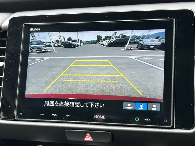 ホンダ フィット e:HEVホーム ブラックスタイル 奈良県 2024(令6)年 1.4万km プレミアムクリスタルレッドM 純正８インチディスプレイオーディオ　/ｂｌｕｅｔｏｏｔｈ　/applecaraplay/androidauto/リアワイドカメラ　/ＥＴＣ　/ハーフレザーシート　/ドライブレコーダー前後　/Hｏｎｄａｓｅｎｓｉｎｇ　/コーナーセンサー前後　/アダブティブクルーズコントロール/ブレーキホールド/LEDヘッドライト/オートライト/純正フロアマット/カーテンエアバッグ