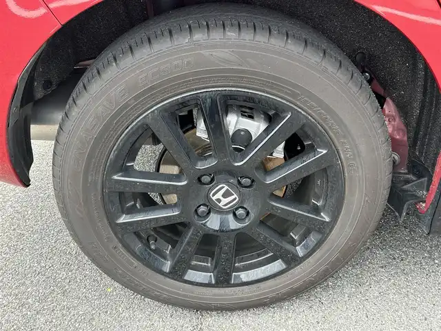 ホンダ フィット e:HEVホーム ブラックスタイル 奈良県 2024(令6)年 1.4万km プレミアムクリスタルレッドM 純正８インチディスプレイオーディオ　/ｂｌｕｅｔｏｏｔｈ　/applecaraplay/androidauto/リアワイドカメラ　/ＥＴＣ　/ハーフレザーシート　/ドライブレコーダー前後　/Hｏｎｄａｓｅｎｓｉｎｇ　/コーナーセンサー前後　/アダブティブクルーズコントロール/ブレーキホールド/LEDヘッドライト/オートライト/純正フロアマット/カーテンエアバッグ