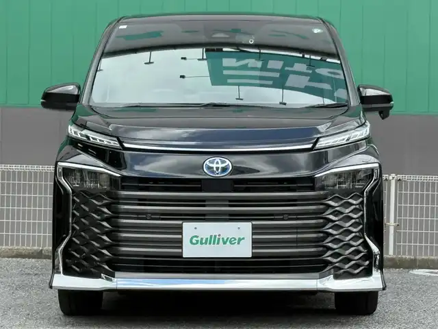 トヨタ ヴォクシー ハイブリッド S－G 千葉県 2023(令5)年 1.8万km アティチュードブラックマイカ 純正8インチディスプレイオーディオ/ETC2.0/両側パワースライド/ユニバーサルステップ/前席シートヒーター/バックカメラ/社外前後ドライブレコーダー/セーフティセンス/レーダークルーズコントロール/LEDヘッドライト