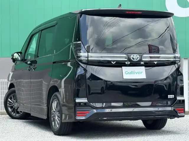 トヨタ ヴォクシー ハイブリッド S－G 千葉県 2023(令5)年 1.8万km アティチュードブラックマイカ 純正8インチディスプレイオーディオ/ETC2.0/両側パワースライド/ユニバーサルステップ/前席シートヒーター/バックカメラ/社外前後ドライブレコーダー/セーフティセンス/レーダークルーズコントロール/LEDヘッドライト