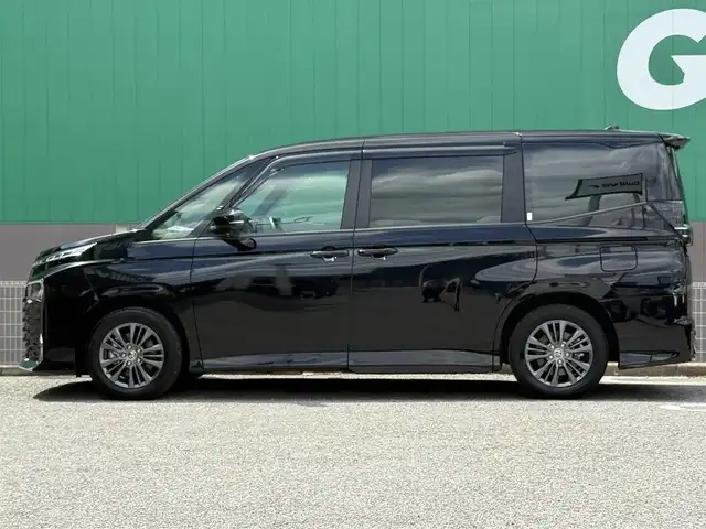 トヨタ ヴォクシー ハイブリッド S－G 千葉県 2023(令5)年 1.8万km アティチュードブラックマイカ 純正8インチディスプレイオーディオ/ETC2.0/両側パワースライド/ユニバーサルステップ/前席シートヒーター/バックカメラ/社外前後ドライブレコーダー/セーフティセンス/レーダークルーズコントロール/LEDヘッドライト