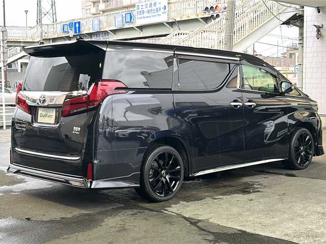 トヨタ アルファードハイブリット エグゼクティブ ラウンジ S 京都府 2019(平31)年 8.4万km スパークリングブラックパールクリスタルシャイン 純正SDナビ /フルセグTV /Bluetooth/CD/DVD/Blu-ray再生機能有/USB/AUX/JBL /純正ビルトインETC2.0/デュアルスピーカー/デュアルエアコン/TRDエアロ （フロント、リア）/BSM /ウィンカーミラー/デジタルインナーミラー/禁煙車 /両側パワースライドドア/パノラミックビューモニター/フリップダウンモニター /前後コーナーセンサー /横滑り防止装置/レーンキープアシスト/盗難防止装置/Wサイドエアバッグ/カーテンエアバッグ/衝突被害軽減ブレーキ/LEDヘッドライト/フロントフォグランプ/オートライト/オートマチックハイビーム/前席＆2列目パワーシート /D席ポジションメモリー/前席シートヒーター/エアシート/ハンドルヒーター/2列目サンシェード/ツインサンシェード/エンジンスターター付（キーレス機能有）