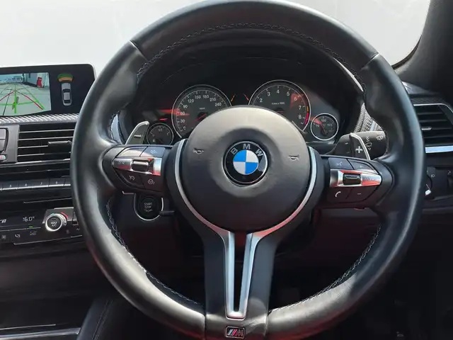 ＢＭＷ Ｍ４ クーペ 東京都 2016(平28)年 3万km サファイアブラックP 内装サモールオレンジ/アダクティブMサスペンション/純正19インチ437/ヘッドアップディスプレイ/純正ナビ/フルセグTV/純正Hifiスピーカー/アダクティブLEDライト/ドライビングアシスト/レザーシート/シートヒーター/レーンキープアシスト/衝突軽減ブレーキ/ブラインドスポット