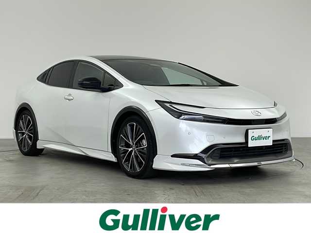 トヨタ プリウス Z 愛知県 2023(令5)年 2.5万km プラチナホワイトパールマイカ /禁煙車//E-Four//純正12.3インチディスプレイオーディオ//フルセグTV//パノラミックビューモニター//バックカメラ//ビルトインETC2.0//モデリスタエアロ//パノラマルーフ//デジタルインナーミラー//トヨタセーフティセンス//プリクラッシュセーフティ//FCTA+LCA//LTA+LDA//レーダークルーズコントロール//アダプティブハイビームシステム//ロードサインアシスト//ドライバー異常時対応システム//プロアクティブドライビングアシスト//トヨタチームメイト//アドバンストパーク(リモート機能付)//パーキングサポートブレーキ//BSM+安心降車アシスト+RCTA//LEDヘッドライト//オートライト//リヤフォグランプ//黒合皮シート(レッド加飾)//運転席パワーシート(ポジションメモリー付)//前席シートヒーター+ベンチレーション//ワイヤレス充電器//ナノイーX//AC100V//純正フロアマット//革巻きステアリング//ステアリングスイッチ//ステアリングヒーター//プッシュスタート//電動格納ミラーウィンカー//電子パーキングブレーキ//ブレーキホールド//スペアキー