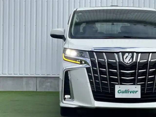 トヨタ アルファード S Cパッケージ 香川県 2020(令2)年 3.9万km ホワイトパールクリスタルシャイン 純正ディスプレイオーディオ/→AM/FM/Bluetooth/フルセグTV/フリップダウンモニター（OP）/サンルーフ（OP）/デジタルインナーミラー（MOP）/ブラインドスポットモニター/レザーシート/シートヒーター・エアシート/レーダークルーズコントロール/レーンキープアシスト/トヨタセーフティセンス/前後ドライブレコーダー/両側パワースライドドア/ビルトイン2.0ETC/コーナーセンサー/パワーバックドア/パワーシート/メモリーシート/ハンドルヒーター/ウッドコンビステアリング/ステアリングスイッチ/プッシュスタート/スマートキー/オットマン/サンシェード/純正フロアマット/純正18インチアルミホイール