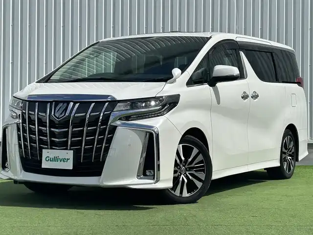 トヨタ アルファード S Cパッケージ 香川県 2020(令2)年 3.9万km ホワイトパールクリスタルシャイン 純正ディスプレイオーディオ/→AM/FM/Bluetooth/フルセグTV/フリップダウンモニター（OP）/サンルーフ（OP）/デジタルインナーミラー（MOP）/ブラインドスポットモニター/レザーシート/シートヒーター・エアシート/レーダークルーズコントロール/レーンキープアシスト/トヨタセーフティセンス/前後ドライブレコーダー/両側パワースライドドア/ビルトイン2.0ETC/コーナーセンサー/パワーバックドア/パワーシート/メモリーシート/ハンドルヒーター/ウッドコンビステアリング/ステアリングスイッチ/プッシュスタート/スマートキー/オットマン/サンシェード/純正フロアマット/純正18インチアルミホイール