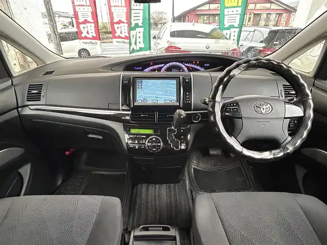 トヨタ エスティマ アエラス 茨城県 2012(平24)年 7.4万km ホワイトパールクリスタルシャイン 純正ナビ(NHZN-X62G)/(FM/AM/Bluetooth/TV/CD/DVD)/バックカメラ/フリップダウンモニター/両側パワースライドドア/クルーズコントロール/ETC/オットマン(2列目)/ドライブレコーダー(前後)/スペアキー/オートライト/純正AW