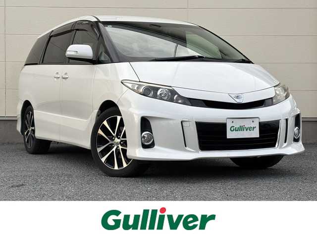 トヨタ エスティマ アエラス 茨城県 2012(平24)年 7.4万km ホワイトパールクリスタルシャイン 純正ナビ(NHZN-X62G)/(FM/AM/Bluetooth/TV/CD/DVD)/バックカメラ/フリップダウンモニター/両側パワースライドドア/クルーズコントロール/ETC/オットマン(2列目)/ドライブレコーダー(前後)/スペアキー/オートライト/純正AW