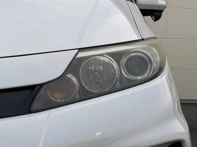 トヨタ エスティマ アエラス 茨城県 2012(平24)年 7.4万km ホワイトパールクリスタルシャイン 純正ナビ(NHZN-X62G)/(FM/AM/Bluetooth/TV/CD/DVD)/バックカメラ/フリップダウンモニター/両側パワースライドドア/クルーズコントロール/ETC/オットマン(2列目)/ドライブレコーダー(前後)/スペアキー/オートライト/純正AW