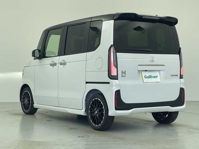 ホンダ Ｎ ＢＯＸ カスタム ターボ コーディネートS 愛知県 2025(令7)年 0.1千km プラチナホワイトパール 届出済未使用車/登録時76キロ/純正9型ナビ/・フルセグTV/・CD・DVD/・Bluetooth/ステアリングスイッチ/バックカメラ/前席シートヒーター/両側電動スライドドア/純正フロアマット/コーナーセンサー/純正LEDヘッドライト/ホンダセンシング/・衝突軽減ブレーキ（CTBS/・先行車発信お知らせ/・路外逸脱抑制機能/・標識認識機能/・渋滞追従機能付きアダプティブクルーズコントロール/・車線維持支援システム（LKAS/・誤発進・誤後退抑制機能/・近距離衝突軽減ブレーキ/・急アクセル抑制機能/・オートハイビーム