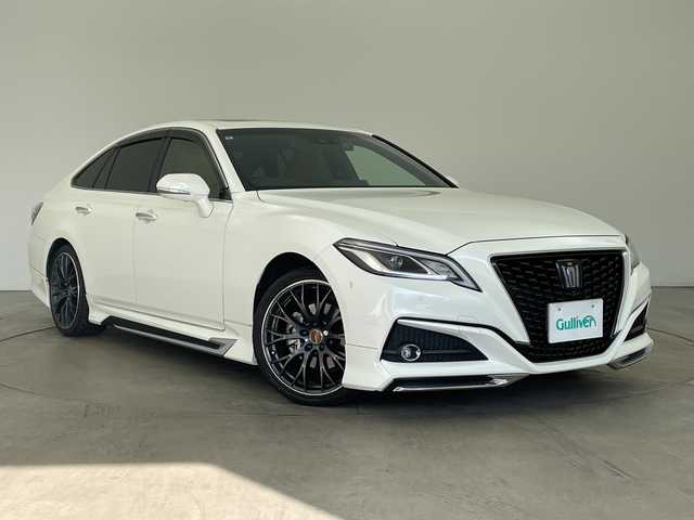 トヨタ クラウン ハイブリッド S エレガンススタイルⅡ 兵庫県 2020(令2)年 7万km ホワイトパールクリスタルシャイン ・純正SDナビ（フルセグ・BT・ブルーレイ・SD・USB）/・アラウンドビューカメラ/・ビルトインETC２．０/・前後ドライブレコーダー/・サンルーフ/・モデリスタエアロ/・RAYS製19インチアルミホイール（HOMURA）/・デジタルインナーミラー/・ハーフレザー/・シートヒーター/・パワーシート/・ステアリングヒーター/・トヨタセーフティセンス/・レーダークルーズコントロール/・レーントレーシングアシスト/・ブラインドスポットモニター/・クリアランスソナー/・リアクロストラフィックアラート/・パーキングサポートブレーキ/・ヘッドアップディスプレイ/・ロードサインアシスト/・先行車発進告知/・パーキングアシスト/・オートマチックハイビーム/・LEDオートライト/・フォグランプ/・電動パーキングブレーキ/・ブレーキホールド/・パドルシフト/・ステアリングリモコン/・横滑り防止装置/・ドアバイザー/・電動格納ミラー/・ウインカーミラー/・スマートキー/・スペアキー/・プッシュスタート/・W＋サイドエアバック/・カーテンエアバック