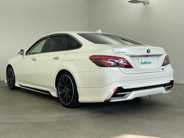 トヨタ クラウン ハイブリッド S エレガンススタイルⅡ 兵庫県 2020(令2)年 7万km ホワイトパールクリスタルシャイン ・純正SDナビ（フルセグ・BT・ブルーレイ・SD・USB）/・アラウンドビューカメラ/・ビルトインETC２．０/・前後ドライブレコーダー/・サンルーフ/・モデリスタエアロ/・RAYS製19インチアルミホイール（HOMURA）/・デジタルインナーミラー/・ハーフレザー/・シートヒーター/・パワーシート/・ステアリングヒーター/・トヨタセーフティセンス/・レーダークルーズコントロール/・レーントレーシングアシスト/・ブラインドスポットモニター/・クリアランスソナー/・リアクロストラフィックアラート/・パーキングサポートブレーキ/・ヘッドアップディスプレイ/・ロードサインアシスト/・先行車発進告知/・パーキングアシスト/・オートマチックハイビーム/・LEDオートライト/・フォグランプ/・電動パーキングブレーキ/・ブレーキホールド/・パドルシフト/・ステアリングリモコン/・横滑り防止装置/・ドアバイザー/・電動格納ミラー/・ウインカーミラー/・スマートキー/・スペアキー/・プッシュスタート/・W＋サイドエアバック/・カーテンエアバック