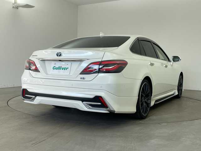 トヨタ クラウン ハイブリッド S エレガンススタイルⅡ 兵庫県 2020(令2)年 7万km ホワイトパールクリスタルシャイン ・純正SDナビ（フルセグ・BT・ブルーレイ・SD・USB）/・アラウンドビューカメラ/・ビルトインETC２．０/・前後ドライブレコーダー/・サンルーフ/・モデリスタエアロ/・RAYS製19インチアルミホイール（HOMURA）/・デジタルインナーミラー/・ハーフレザー/・シートヒーター/・パワーシート/・ステアリングヒーター/・トヨタセーフティセンス/・レーダークルーズコントロール/・レーントレーシングアシスト/・ブラインドスポットモニター/・クリアランスソナー/・リアクロストラフィックアラート/・パーキングサポートブレーキ/・ヘッドアップディスプレイ/・ロードサインアシスト/・先行車発進告知/・パーキングアシスト/・オートマチックハイビーム/・LEDオートライト/・フォグランプ/・電動パーキングブレーキ/・ブレーキホールド/・パドルシフト/・ステアリングリモコン/・横滑り防止装置/・ドアバイザー/・電動格納ミラー/・ウインカーミラー/・スマートキー/・スペアキー/・プッシュスタート/・W＋サイドエアバック/・カーテンエアバック