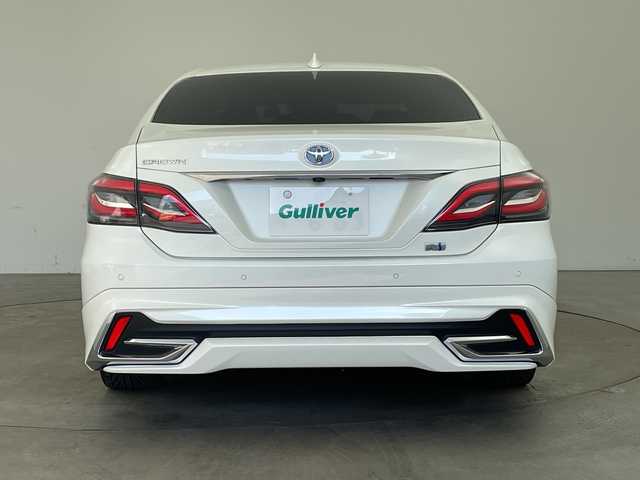 トヨタ クラウン ハイブリッド S エレガンススタイルⅡ 兵庫県 2020(令2)年 7万km ホワイトパールクリスタルシャイン ・純正SDナビ（フルセグ・BT・ブルーレイ・SD・USB）/・アラウンドビューカメラ/・ビルトインETC２．０/・前後ドライブレコーダー/・サンルーフ/・モデリスタエアロ/・RAYS製19インチアルミホイール（HOMURA）/・デジタルインナーミラー/・ハーフレザー/・シートヒーター/・パワーシート/・ステアリングヒーター/・トヨタセーフティセンス/・レーダークルーズコントロール/・レーントレーシングアシスト/・ブラインドスポットモニター/・クリアランスソナー/・リアクロストラフィックアラート/・パーキングサポートブレーキ/・ヘッドアップディスプレイ/・ロードサインアシスト/・先行車発進告知/・パーキングアシスト/・オートマチックハイビーム/・LEDオートライト/・フォグランプ/・電動パーキングブレーキ/・ブレーキホールド/・パドルシフト/・ステアリングリモコン/・横滑り防止装置/・ドアバイザー/・電動格納ミラー/・ウインカーミラー/・スマートキー/・スペアキー/・プッシュスタート/・W＋サイドエアバック/・カーテンエアバック