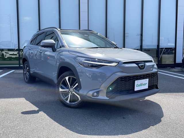 トヨタ カローラ クロス ハイブリッド Z 愛知県 2024(令6)年 0.1万km未満 セメントグレーメタリック 10型ディスプレイオーディオ　/パノラマルーフ　/ナビ/アラウンドビューモニター　/パワーバックドア　/パーキングサポートブレーキ　/アドバンストパーク　/ブラインドスポットモニター　/ハーフレザーシート　/ETC