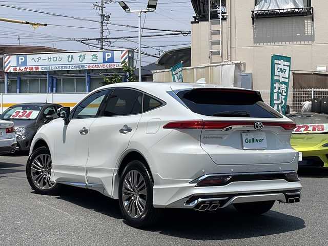 トヨタ ハリアー Z レザーパッケージ 愛知県 2024(令6)年 0.3万km プラチナホワイトパールマイカ /禁煙車//ワンオーナー//メーカーナビ//フルセグ/BT/USB/FM/AM/Miracast//TVキャンセラー//JBLプレミアムサウンド//パノラミックビューモニタ//パノラマルーフ//パワーバックドア//モデリスタエアロ//バックドアエアロプレート//バックドアガーニッシュ//フードガーニッシュ//フロントグリルガーニッシュ//シグネチャーイルミグリル//デジタルインナーミラー//純正19AW//PCS/LTA/RSA/AHB/ACC//RCTA/PKSB/BSM/HUD//先行車発進告知//後退速度抑制//LEDオートライト/フォグ//オートリトラウィンカーミラー//前席パワーシート//シートメモリ//前席シートヒーター//前席エアーシート//ランバーサポート//黒革シート//本革巻ステアリング//ステアリングスイッチ//電動パーキング//オートホールド//MTモード付AT//プッシュスタート//DRIVE MODE/NORMAL/ECO/SPORT//nanox//横滑り防止//スペアタイヤ//置くだけ充電//新車時保証書//取扱説明書/マルチメディア取説//スマートキー//スマートスペアキー