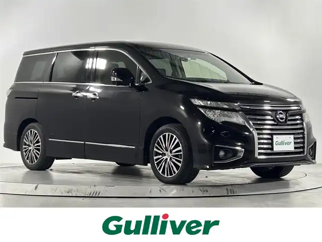 日産 エルグランド 250ハイウェイスター 佐賀県 2014(平26)年 7.2万km ファントムブラック 純正8インチナビ/フルセグTV/CD/DVD/アルパイン製10インチフリップダウンモニター/全方位カメラ/クルーズコントロール/横滑り防止装置/コーナーセンサー/オートライト/LEDヘッドライト/フォグライト/ビルトインETC/前方ドライブレコーダー/両側パワースライドドア/オットマン/ハーフレザーシート/ISOFIX対応シート/社外フロアマット/純正18インチアルミホイール/プッシュスタート/スマートキー/スペアキー×１