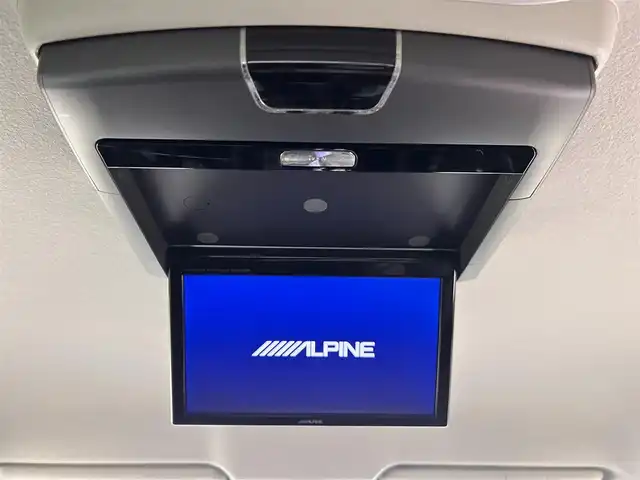 日産 エルグランド 250ハイウェイスター 佐賀県 2014(平26)年 7.2万km ファントムブラック 純正8インチナビ/フルセグTV/CD/DVD/アルパイン製10インチフリップダウンモニター/全方位カメラ/クルーズコントロール/横滑り防止装置/コーナーセンサー/オートライト/LEDヘッドライト/フォグライト/ビルトインETC/前方ドライブレコーダー/両側パワースライドドア/オットマン/ハーフレザーシート/ISOFIX対応シート/社外フロアマット/純正18インチアルミホイール/プッシュスタート/スマートキー/スペアキー×１