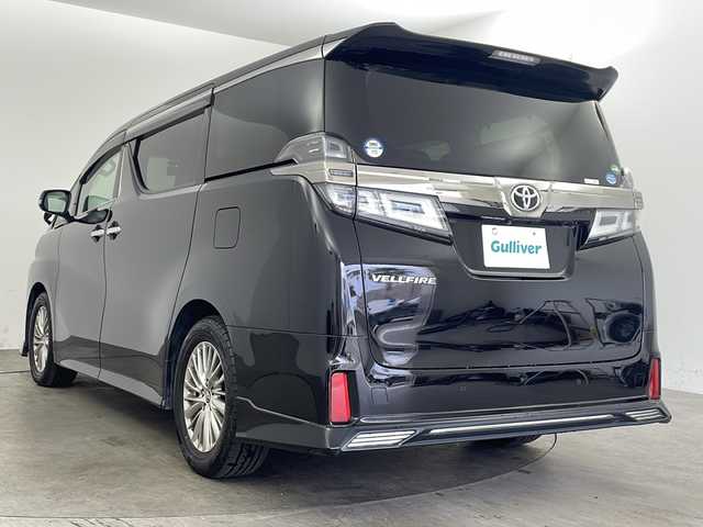トヨタ ヴェルファイア Z Gエディション 兵庫県 2018(平30)年 6.7万km ブラック ・アルパイン11インチナビ（EX11Z）/　CD/DVD再生/　USB接続/　ipod接続/　HDMI接続/　Bluetoothオーディオ/　フルセグテレビ/・バックカメラ/・ビルドインETC/・Toyota Safety Sense/　プリクラッシュセーフティ/　レーンディパーチャーアラート/　オートマチックハイビーム/・先行車発進告知機能/・パーキングサポートブレーキ（前後方静止物）/・車両接近通報装置/・ABS/・横滑り防止機能/・前後コーナーセンサー/・盗難防止装置/・オートライト/・LEDヘッドライト/・W＋サイドエアバック/・カーテンエアバック/・三列シート/・オットマン/・電動リアゲート/・前後ドライブレコーダー/・ウォークスルー/・純正フロアマット/・パワーシート（（運転席・助手席・2列目）/・メモリーシート（運転席）/・レザーシート/・エアシート（運転席・助手席）/・シートヒーター（運転席・助手席）/・ステアリングヒーター/・両側パワースライドドア/・TRDエアロパーツ（フロント）/・純正17インチアルミホイール/・WACエアコン/・スマートキー/・スペアキー