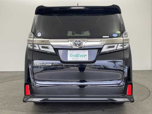 トヨタ ヴェルファイア Z Gエディション 兵庫県 2018(平30)年 6.7万km ブラック ・アルパイン11インチナビ（EX11Z）/　CD/DVD再生/　USB接続/　ipod接続/　HDMI接続/　Bluetoothオーディオ/　フルセグテレビ/・バックカメラ/・ビルドインETC/・Toyota Safety Sense/　プリクラッシュセーフティ/　レーンディパーチャーアラート/　オートマチックハイビーム/・先行車発進告知機能/・パーキングサポートブレーキ（前後方静止物）/・車両接近通報装置/・ABS/・横滑り防止機能/・前後コーナーセンサー/・盗難防止装置/・オートライト/・LEDヘッドライト/・W＋サイドエアバック/・カーテンエアバック/・三列シート/・オットマン/・電動リアゲート/・前後ドライブレコーダー/・ウォークスルー/・純正フロアマット/・パワーシート（（運転席・助手席・2列目）/・メモリーシート（運転席）/・レザーシート/・エアシート（運転席・助手席）/・シートヒーター（運転席・助手席）/・ステアリングヒーター/・両側パワースライドドア/・TRDエアロパーツ（フロント）/・純正17インチアルミホイール/・WACエアコン/・スマートキー/・スペアキー