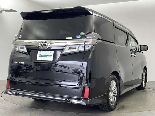 トヨタ ヴェルファイア Z Gエディション 兵庫県 2018(平30)年 6.7万km ブラック ・アルパイン11インチナビ（EX11Z）/　CD/DVD再生/　USB接続/　ipod接続/　HDMI接続/　Bluetoothオーディオ/　フルセグテレビ/・バックカメラ/・ビルドインETC/・Toyota Safety Sense/　プリクラッシュセーフティ/　レーンディパーチャーアラート/　オートマチックハイビーム/・先行車発進告知機能/・パーキングサポートブレーキ（前後方静止物）/・車両接近通報装置/・ABS/・横滑り防止機能/・前後コーナーセンサー/・盗難防止装置/・オートライト/・LEDヘッドライト/・W＋サイドエアバック/・カーテンエアバック/・三列シート/・オットマン/・電動リアゲート/・前後ドライブレコーダー/・ウォークスルー/・純正フロアマット/・パワーシート（（運転席・助手席・2列目）/・メモリーシート（運転席）/・レザーシート/・エアシート（運転席・助手席）/・シートヒーター（運転席・助手席）/・ステアリングヒーター/・両側パワースライドドア/・TRDエアロパーツ（フロント）/・純正17インチアルミホイール/・WACエアコン/・スマートキー/・スペアキー