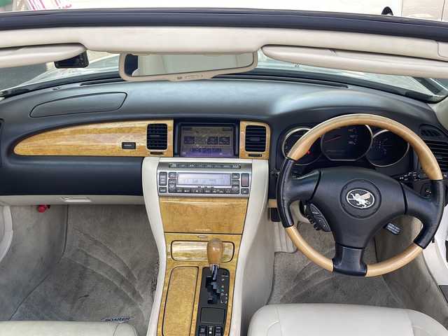 トヨタ ソアラ 430SCV 愛知県 2001(平13)年 11万km ホワイトパールクリスタルシャイン 電動オープン/キーレス/純正ナビ/アナログTV・CD・MD・FM・AM/クルーズコントロール/前席シートヒーター/前席パワーシート/前席シートメモリー機能付きパワーシート/社外19インチアルミホイール/ブレンボブレーキキャリパー/ETC/前方ドライブレコーダー（ユピテル）/木目調パネル/木目調コンビステアリング/木目調シフトノブ/トラクションコントロール/ビークルスタビリティコントロール/オートライト/電格ミラー/純正フロアマット/アクセサリーソケット/保証書/ディーラー点検整備記録簿(R4・R6)