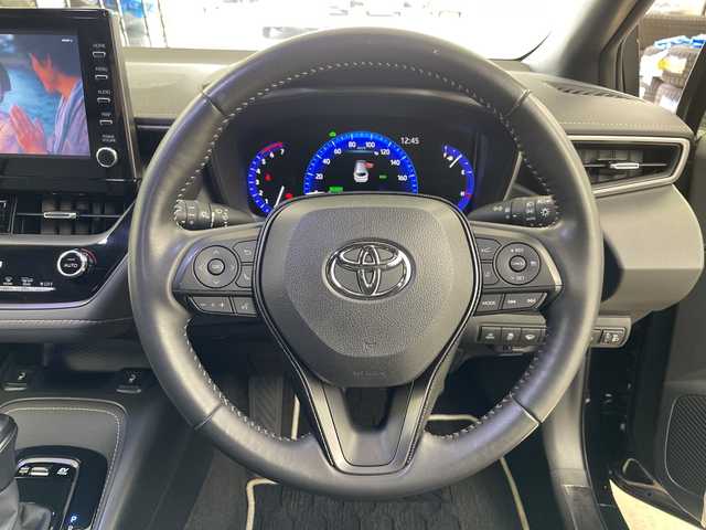 トヨタ カローラツーリング ハイブリッド ダブルバイビー 道央・札幌 2021(令3)年 2.4万km ブラックマイカ ・４WD/ハイブリット/寒冷地仕様/・トヨタセーフティセンス/・レーダークルーズコントロール/・プリクラッシュセーフティ/・ブラインドスポットモニター/・純正9インチディスプレイオーディオ/・Bluetooth.miracast.フルセグ/・バックカメラ /・LEDオートライト/オートハイビーム/・前後ドライブレコーダー/・フロントワイパーデアイサー/・ハーフレザーシート/シートヒーター/・ステアリングヒーター・ミラーヒーター/・エンジンスターター/・ビルトインETC/AC100V